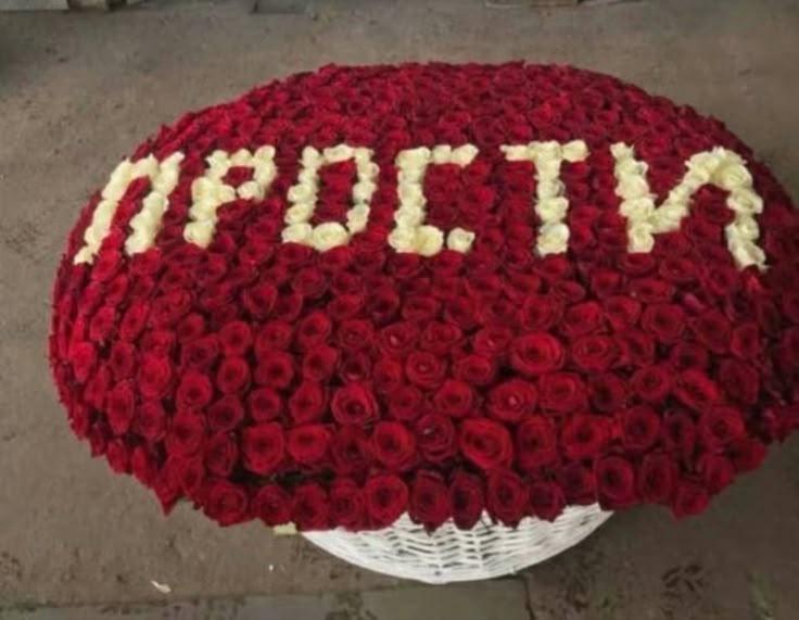 Professional floral arrangement in modern corporate setting